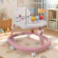 Детские ходунки розовые музыкальные X-624 • Ходунки для малышей с регулировкой высоты, игровыми игрушками и колесами