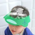 Детский регулируемый козырек для мытья головы и стрижки Baby Shower Cap · Защитная шапочка для купания ребенка