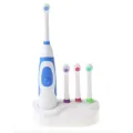 Электрическая зубная щетка Electric ToothBrush 4 в 1 со съемными насадками