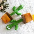Музыкальная игрушка Танцующий поющий кактус Dancing Cactus TikTok с подсветкой и функцией повторения · Кактус – повторюшка USB зарядка
