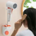 Настенный регулируемый держатель для фена · Органайзер для ванной комнаты с фиксатором фена, крючком для полотенец и отделениями для аксессуаров