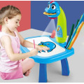 Стол для рисования детский с проектором и доской ∙ Столик для ребенка + Комплект для рисования ∙ Слайды – насадки на проектор ∙ Маркеры ∙ Стиратель ∙ Альбом для творчества ∙ Голубой