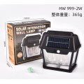 Уличный фонарь на солнечной батарее с датчиком движения HW 999-2W Solar Interaction Wall Lamp · Настенный наружный светильник · 3 режима освещения