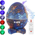 Проектор-ночник Яйцо Динозавра с Bluetooth-колонкой и световыми эффектами ∙ Ночник-проектор Яйцо Динозавра на подставке с пультом
