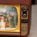 Ретро-телевизор XMAS WDL-24034B с музыкой и снежным вихрем • новогодняя настольная фигурка-ночник с 7 мелодиями, LED-подсветкой и питанием от USB или 3 батареек AA