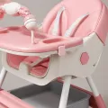 Розовый стульчик-трансформер для кормления и игр 94x60x78 см • Складной детский стул с двойным подносом, игровой дугой и поворотными колесами для малышей от 6 месяцев до 3 лет